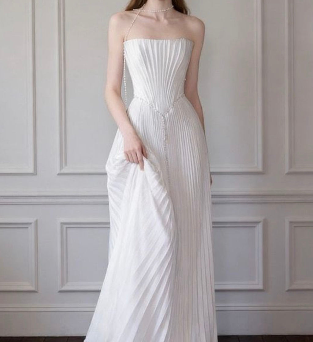 Women’s floor-length strapless pleated dress
