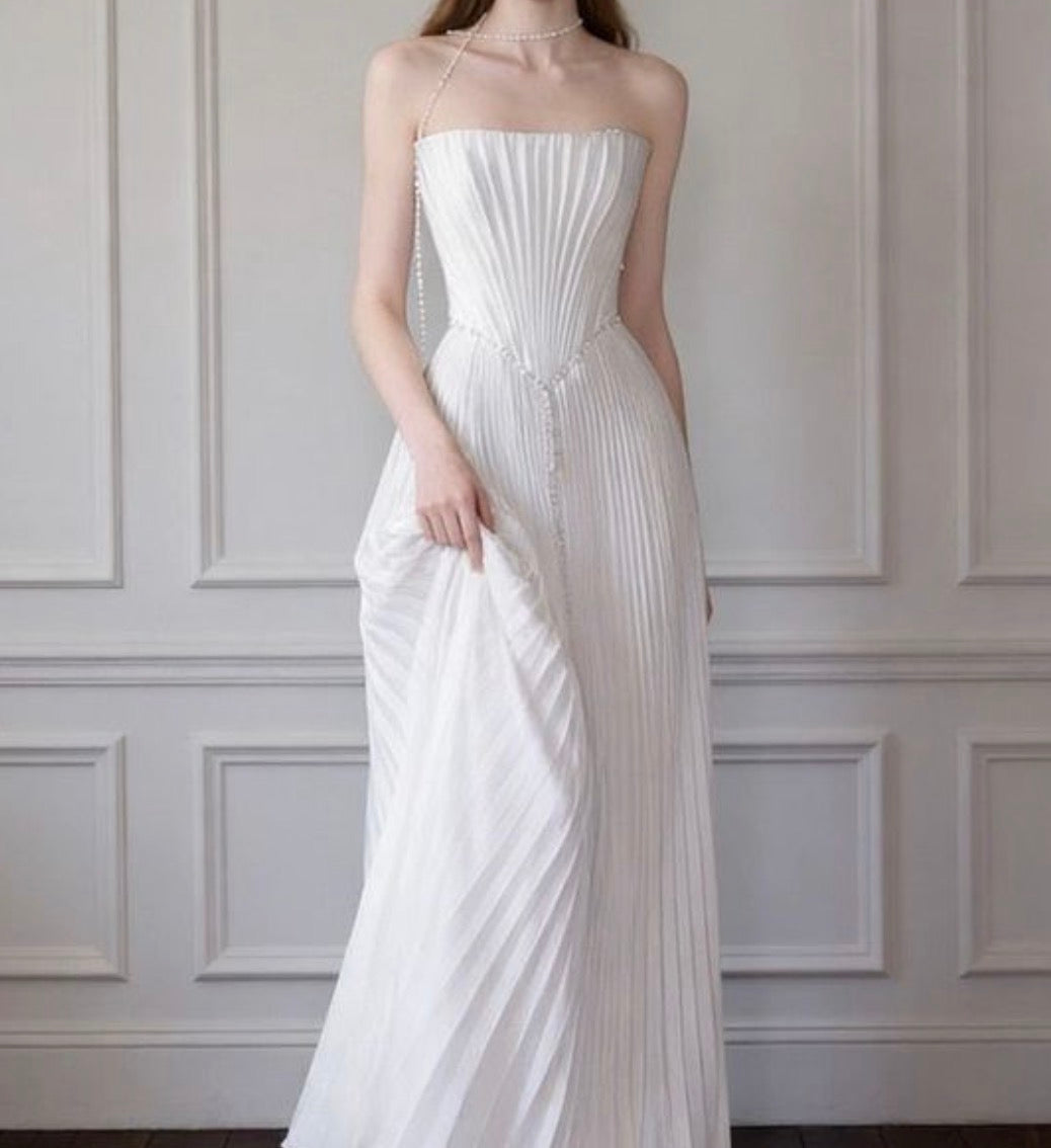 Women’s floor-length strapless pleated dress